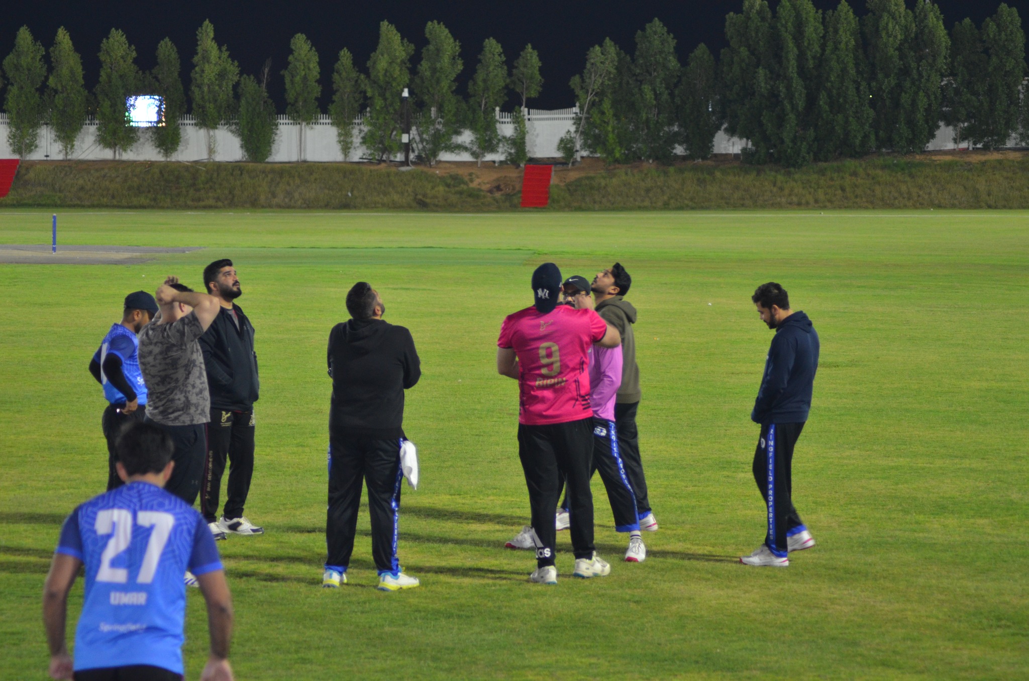 Coaching a young player during a net session